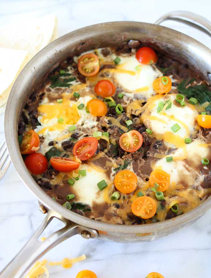 Southwest Refried Black Beans with Spinach & Eggs | thekitchenpaper.com