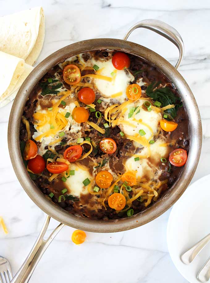 Southwest Refried Black Beans with Spinach & Eggs | thekitchenpaper.com