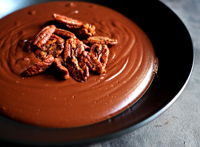 Warm Cocoa Pudding with Smoked Paprika Candied Pecans | thekitchenpaper.com