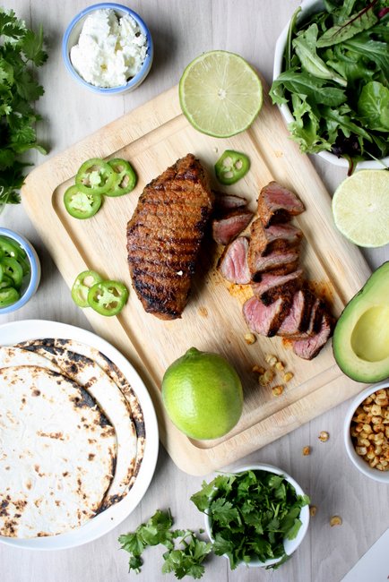 steak tacos with charred corn and goat cheese