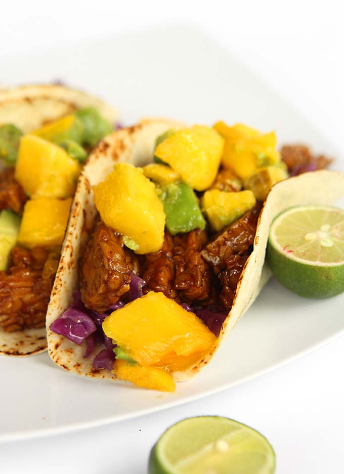 Honey Soy Tempeh Tacos with Mango Avocado Salsa | thekitchenpaper.com