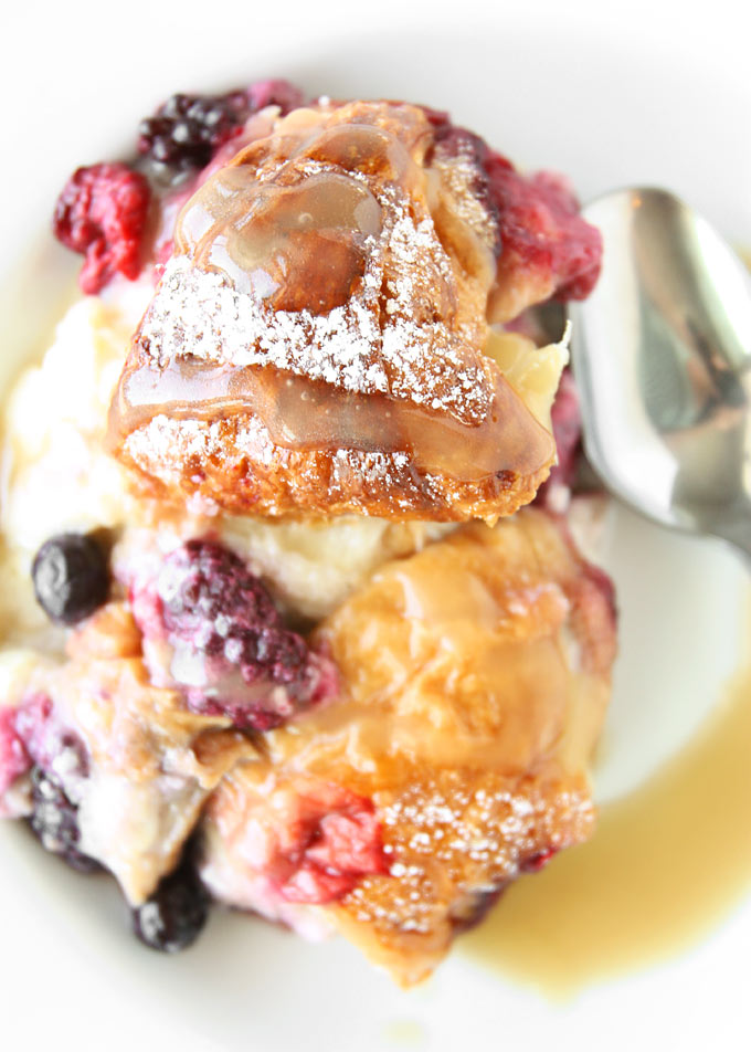 Mixed Berry Croissant Pudding with Whiskey Butter Sauce | thekitchenpaper.com