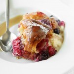 Mixed Berry Croissant Pudding with Whiskey Butter Sauce | thekitchenpaper.com