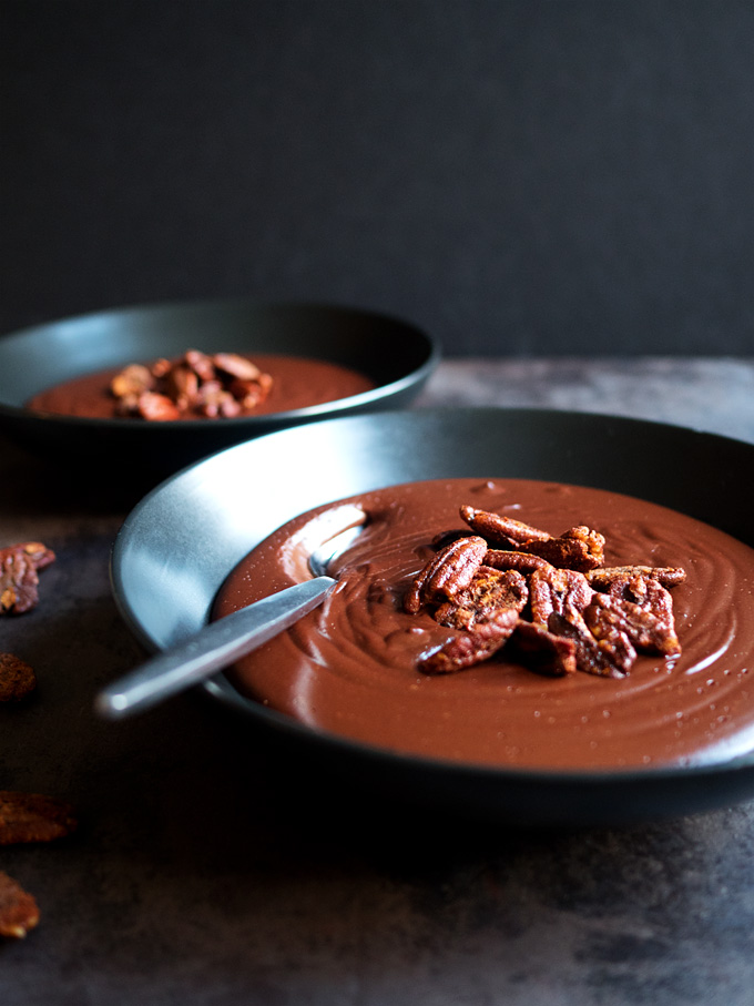 Warm Cocoa Pudding with Smoked Paprika Candied Pecans | thekitchenpaper.com